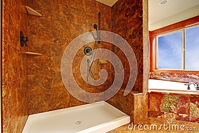 Luxury red marble bathroom in a New luxury home interior.
