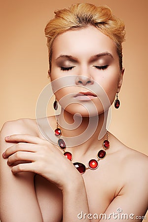 Luxury woman with natural make-up and chic jewelry