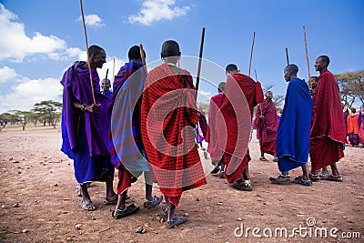 Maasai men in their ritual dance in their village in Tanzania, Africa
