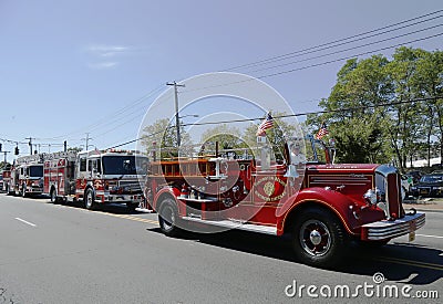 1950 Mack fire truck from Huntington Manor Fire Department leading firetrucks parade in Huntington, New York