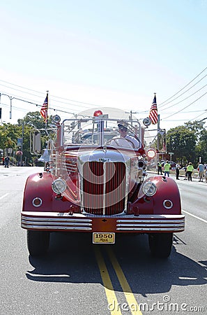 1950 Mack fire truck from Huntington Manor Fire Department at parade in Huntington, New York