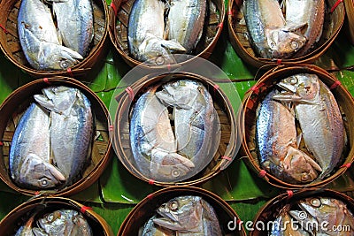 Mackerel fish in bamboo basket
