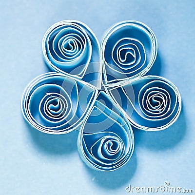 Macro, abstract, background picture of blue paper spirals on paper background