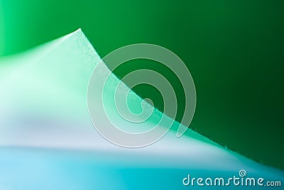 Macro, abstract, background picture of a green paper on paper background