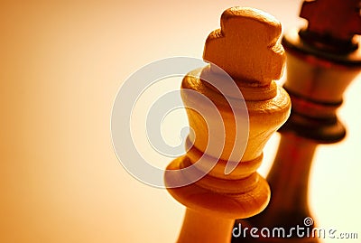 Macro Wooden King Chess Piece on White Background