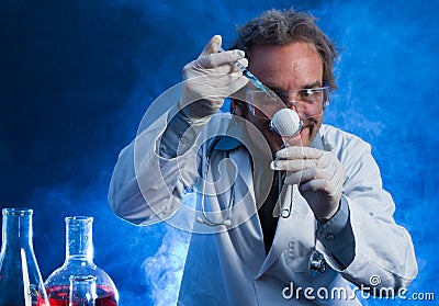 Mad Scientist with Golf Ball and Hypodermic Needle