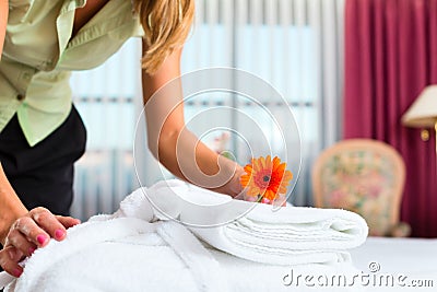 Maid doing room service in hotel