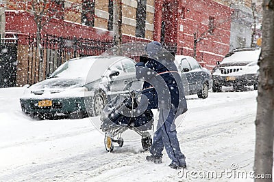 Mail man during snow storm in New York