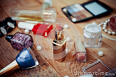 Makeup accessories on wooden