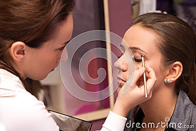 Makeup artist at work