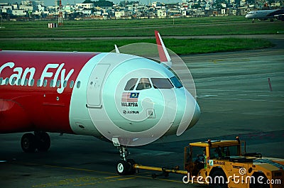 Malaysia airline Air Asia Airbus plane at Ho Chi Minh airport Vietnam
