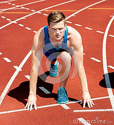 A male athlete ready to run the race