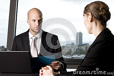Male banker deciding credit