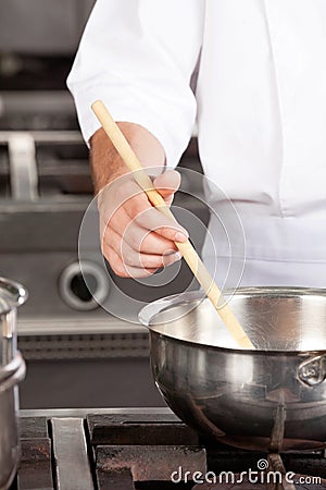 Male Chef preparing Food