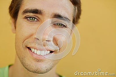 Male college student smiling at camera