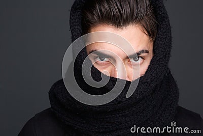 Male fashion model scarf covered face