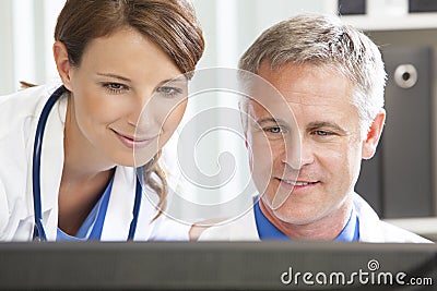 Male Female Hospital Doctors Using Computer