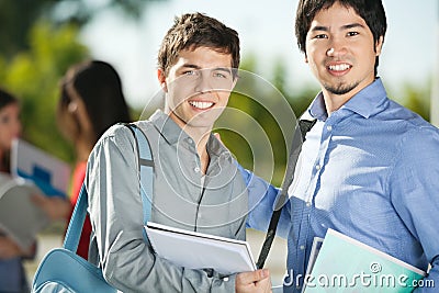 Male Friends Smiling On College Campus