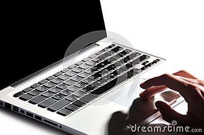 Male hand typing in laptop