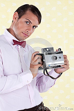 Male Holding Medium Format Camera