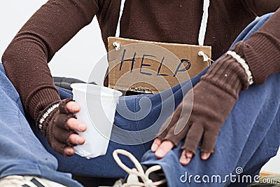 Male homeless with sign