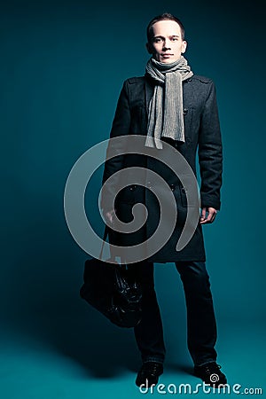 Male model over dark blue background