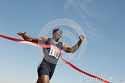 Male Runner Winning Race