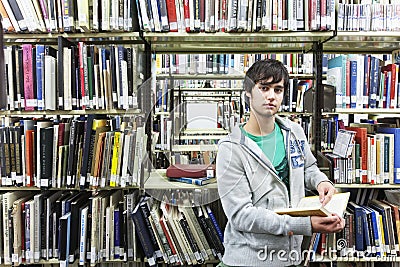 Male University Student In Library