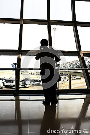 Man at the airport window