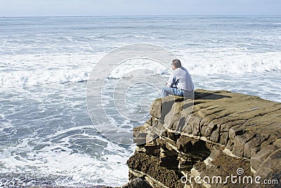 Man Alone Meditating or Thinking