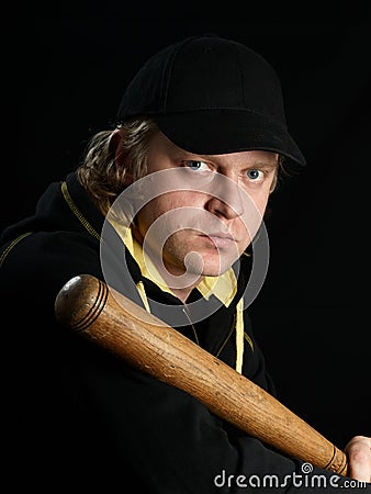 Man with baseball bat in full-face.