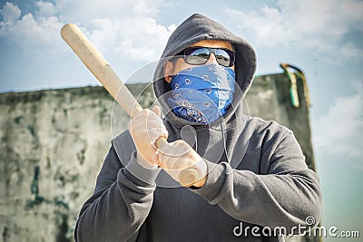 Man with a baseball bat at outdoor