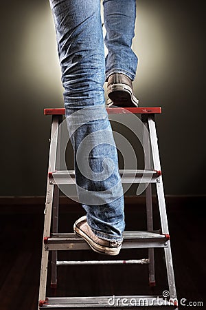 Man climbing on ladder