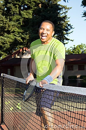 Man on Court Playing Tennis