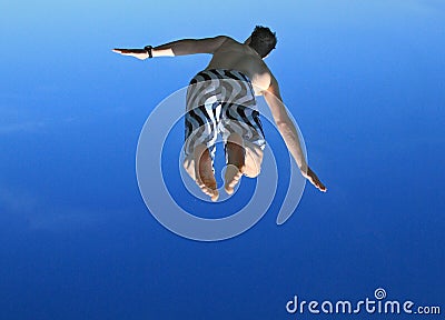 Man diving in the sky