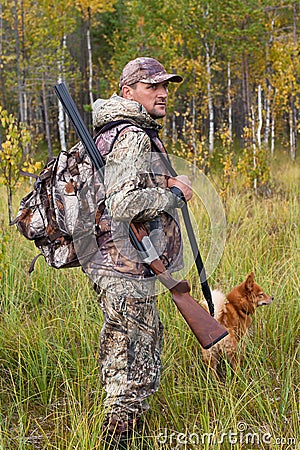 Man with dog out hunting