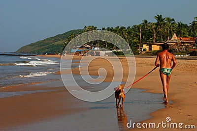 Man & dog in the tropical sun