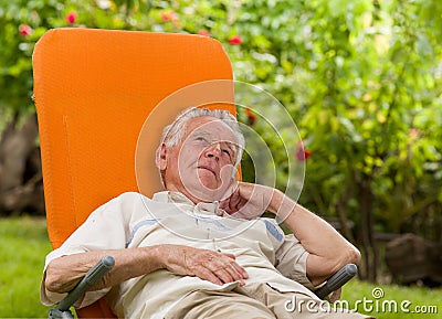 Man enjoying in sunbed