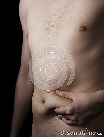 Man with fat deposit on stomach