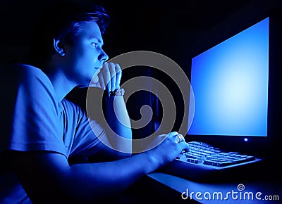 Man in front of computer screen