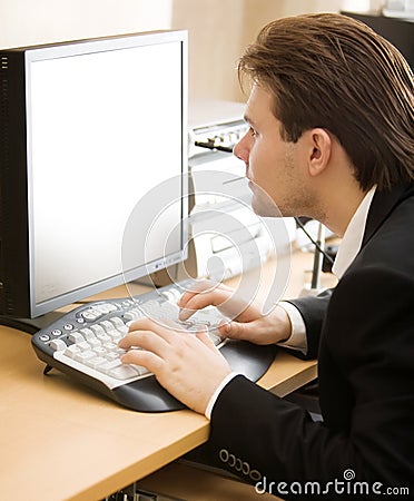 Man in front of computer screen
