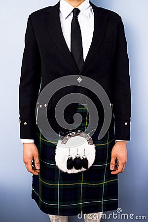 Man in full traditional Scottish kilt outfit