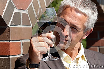 Man with glass of red wine