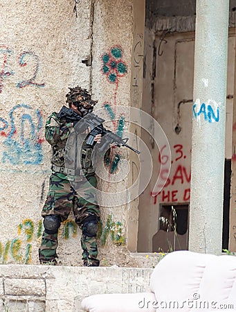 Man with a gun trying to leave the building