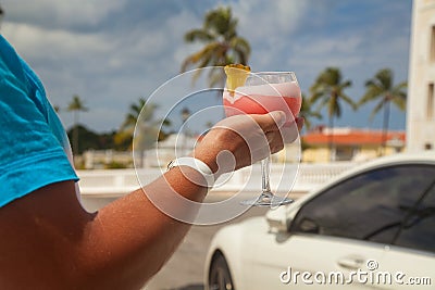 Man hand holding alcohol drink