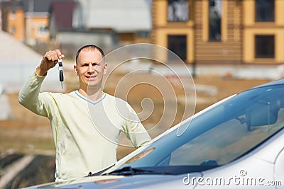 Man holding car keys