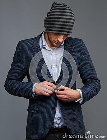 Man in jacket and hat