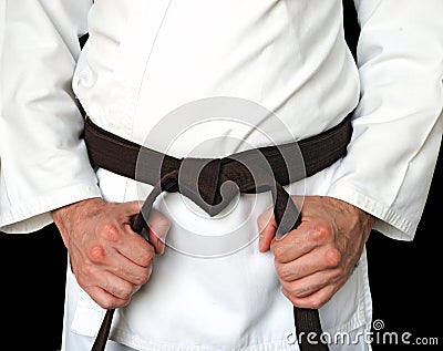 Man in a kimono and belt for martial arts