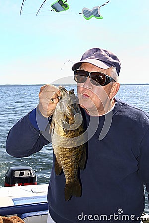 Man Kissing A Fish - Lake Ontario Smallmouth Bass