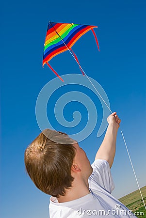 Man with a kite in the sky